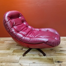 1970's Red 'tongue' Swivel Chair